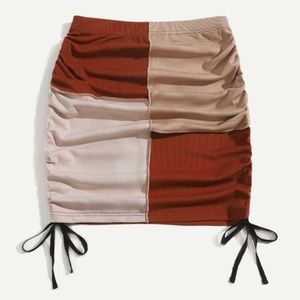 Stitching trim color block skirt.